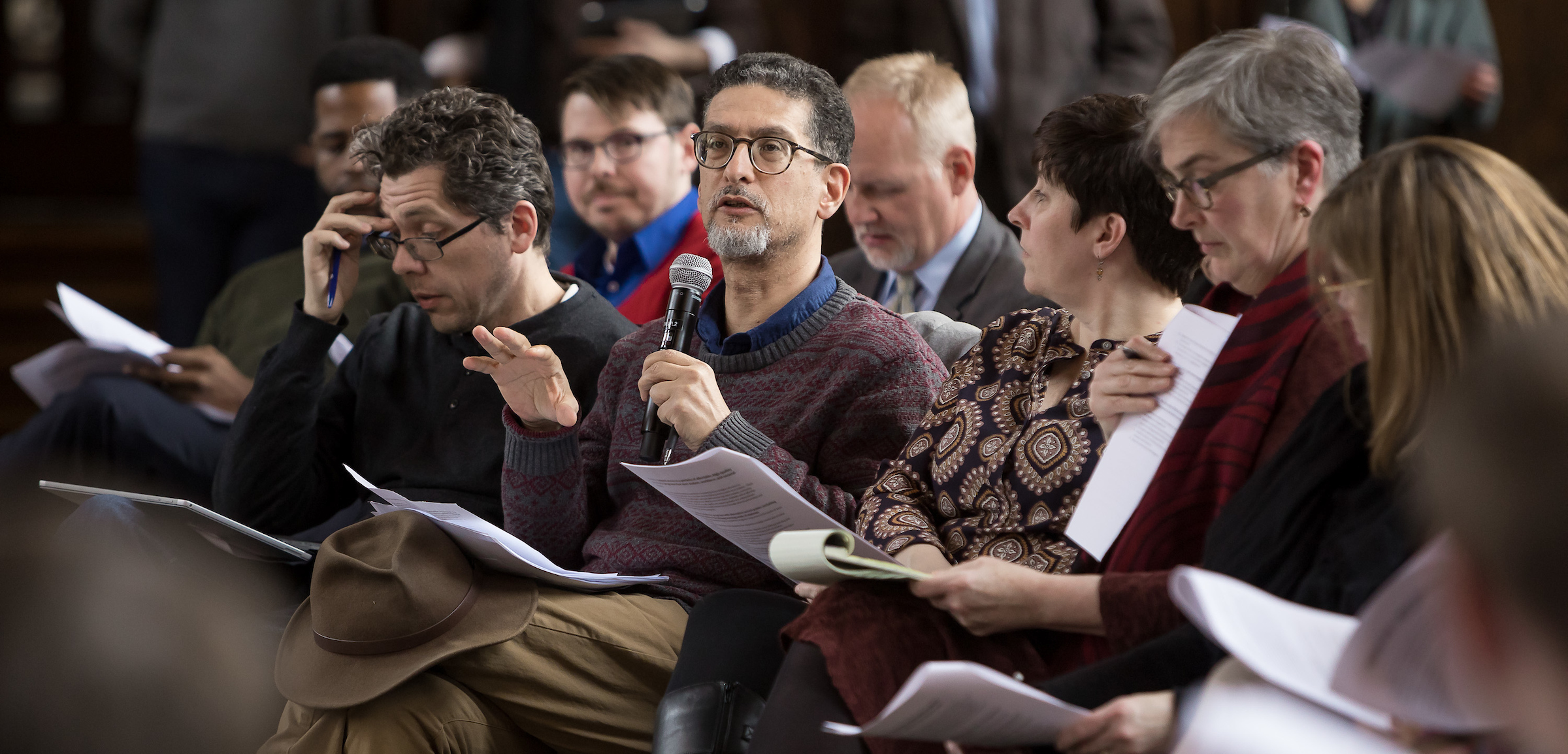 Khaled Keshk, associate professor and chair of Religious Studies, comments during a town hall