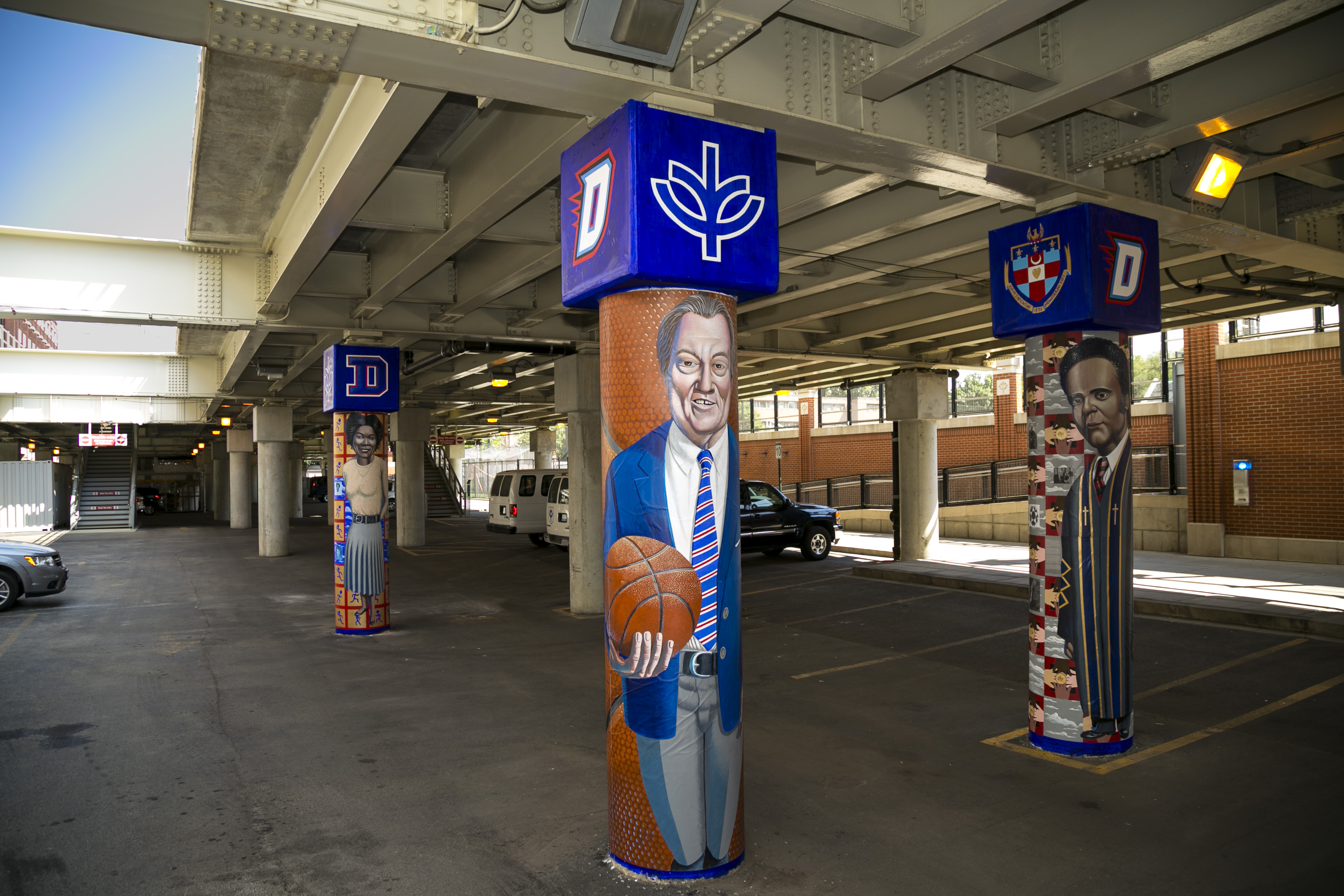 Historical figures from DePaul University past have been memorialized on actual pillars —in a murals painted on the columns beneath the Chicago Fullerton ‘L’ platform.  (DePaul University/Joel Dik)