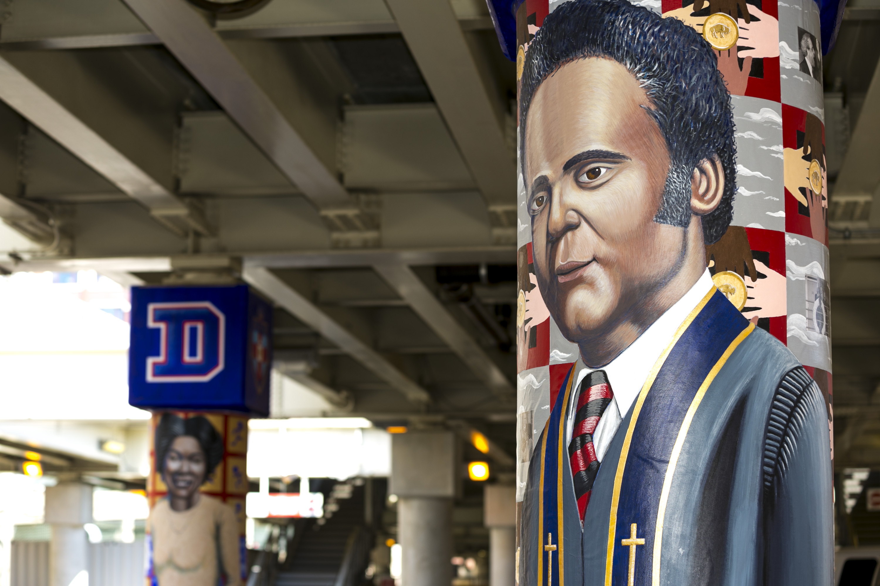 The mural of civil rights activist and DePaul Law School graduate Benjamin Hooks (foreground) is painted next to Olympian and DePaul track star •	Mabel “Dolly” Landry Staton. The murals are part of a larger public art project honoring important historical figures from DePaul's past. (DePaul University/Joel Dik)