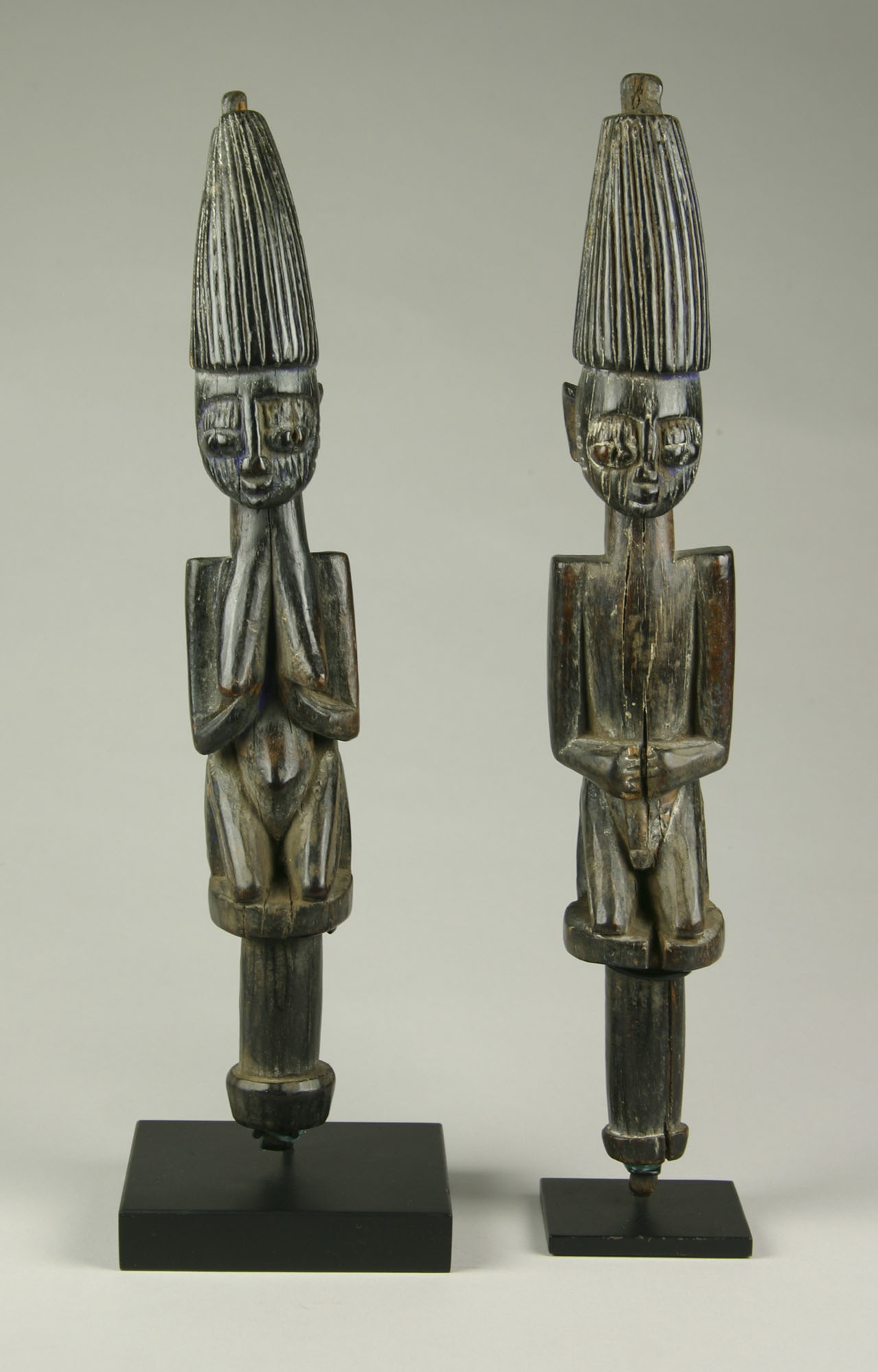Unidentified artist (Yoruba; Nigeria, Africa), Pair of Esu staffs, 20th century. Carved wood. Collection of DePaul Art Museum, gift of the May Weber Foundation, 2001.103ab