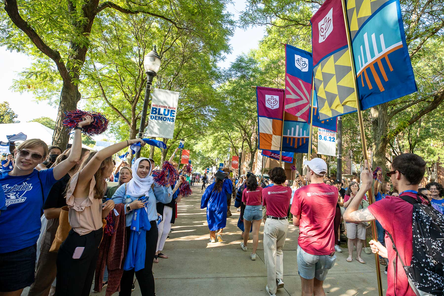 Students carried college banners into the quad while being cheered on by faculty, staff and current students. (DePaul University/Jeff Carrion)