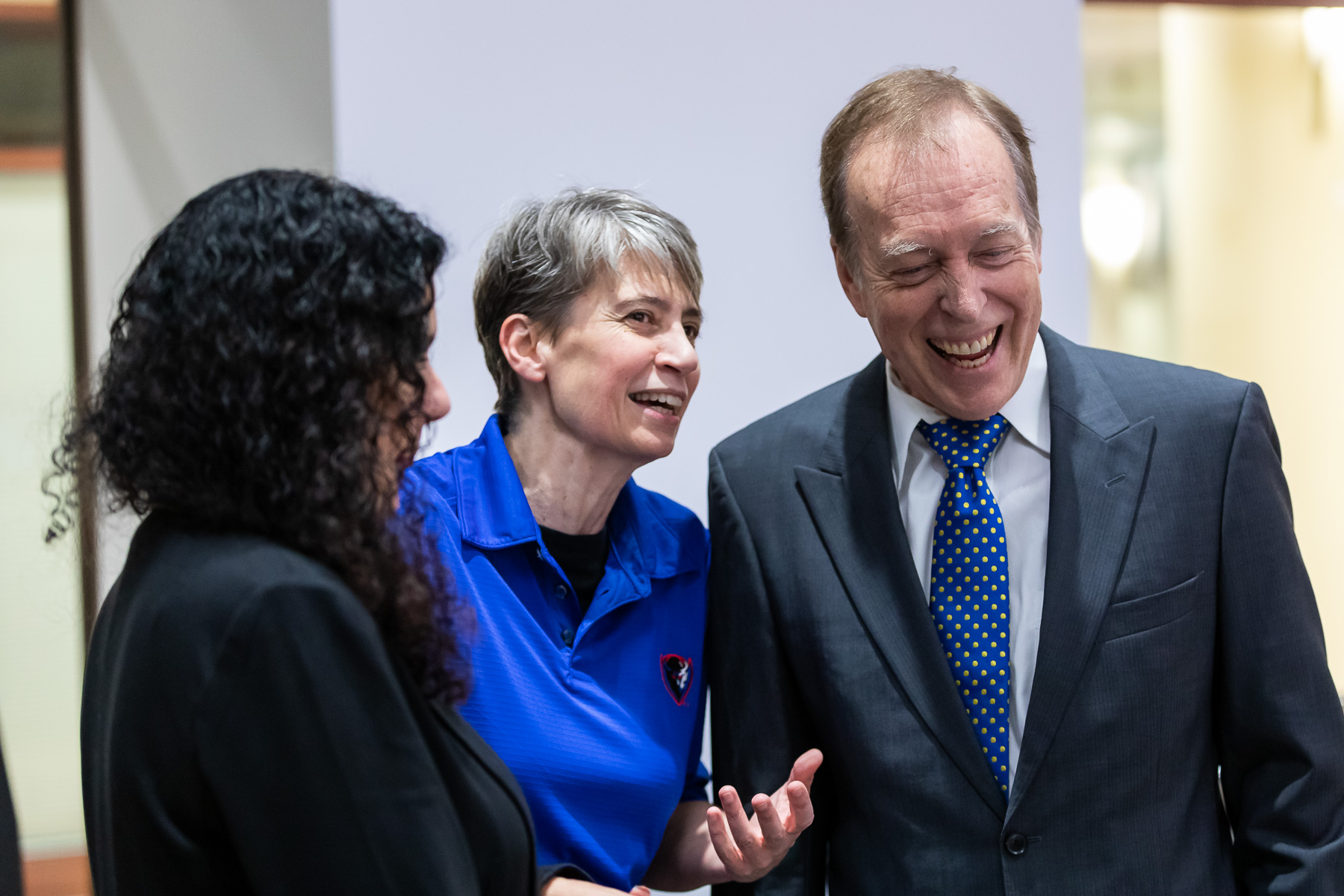 Left to right, Salma Ghanem, provost, Lucia Dettori, interim dean of the Jarvis College of Computing and Digital Media, and Eugene Jarvis, game designer in residence, at the grand opening celebration.