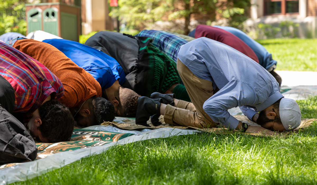 Members of DePaul’s Muslim Student Association pray on the Lincoln Park Campus in 2019.