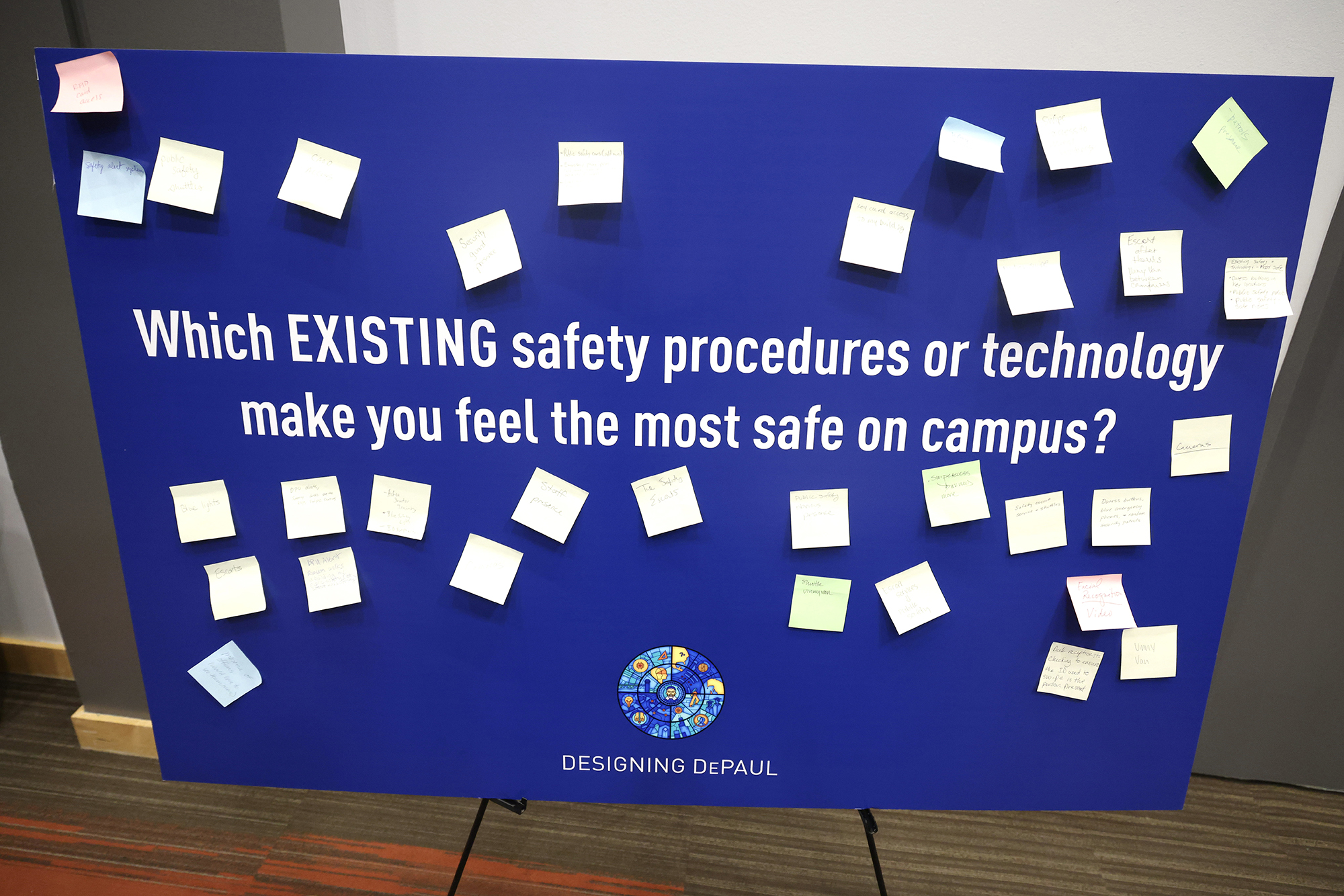 Sign reads: "Which existing safety procedures or technology make you feel most safe on campus?