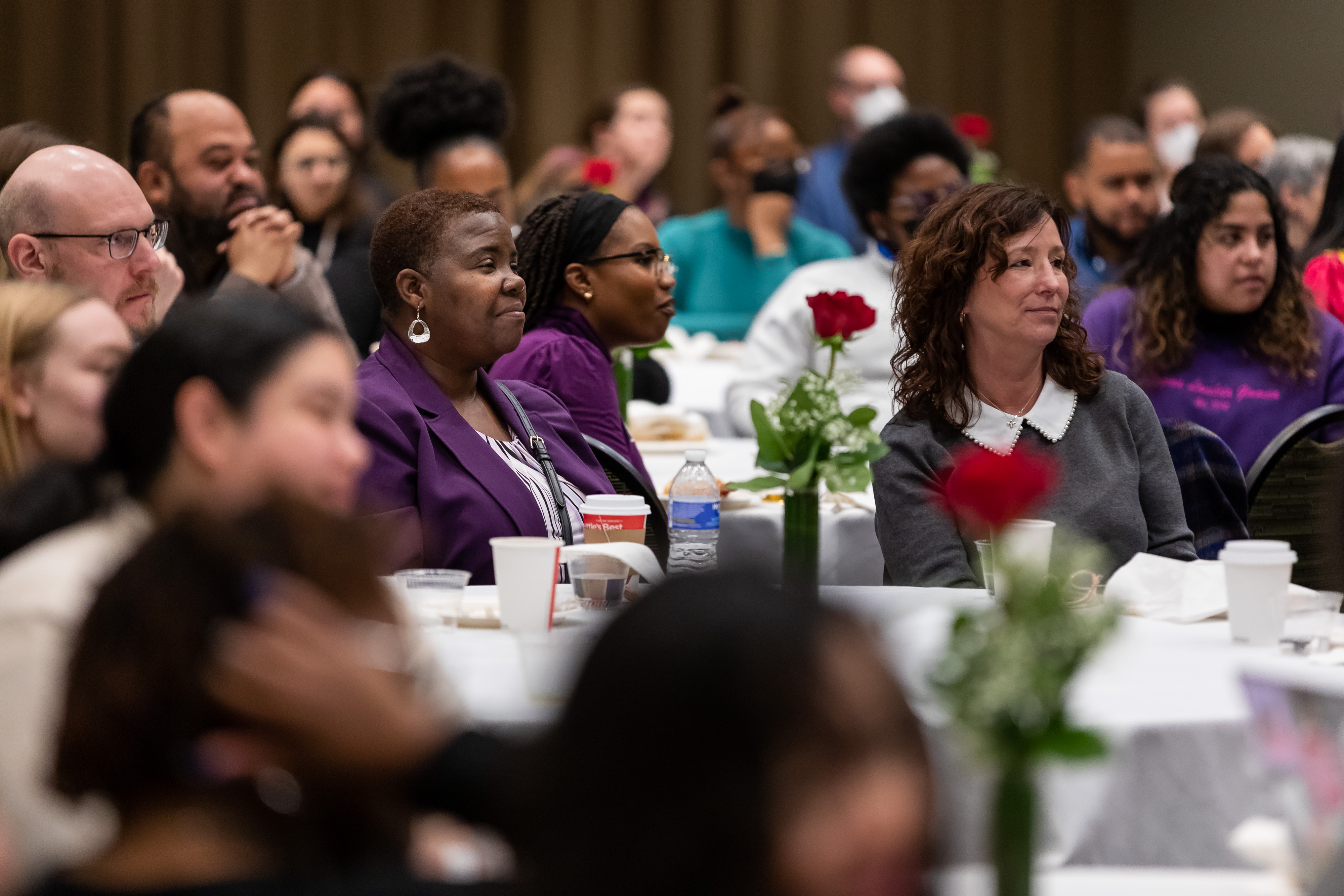 People listening to speaker at MLK breakfast