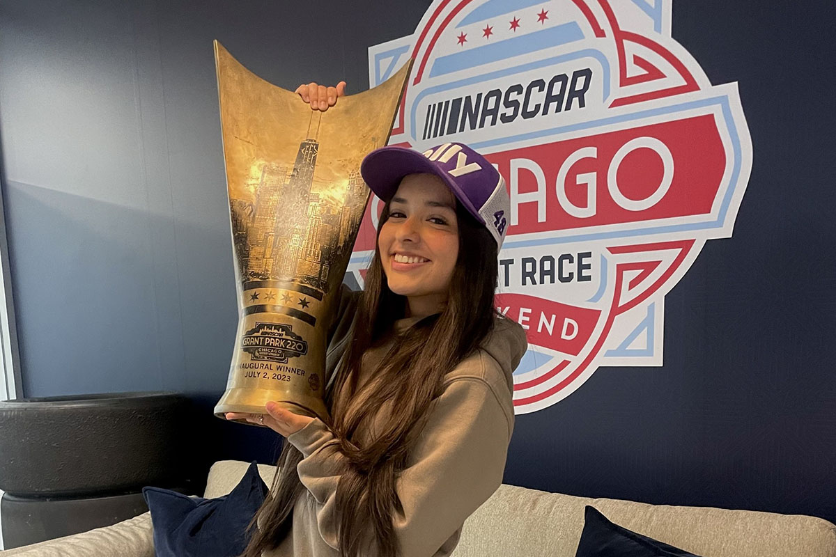 Angela Hernandez with NASCAR trophy