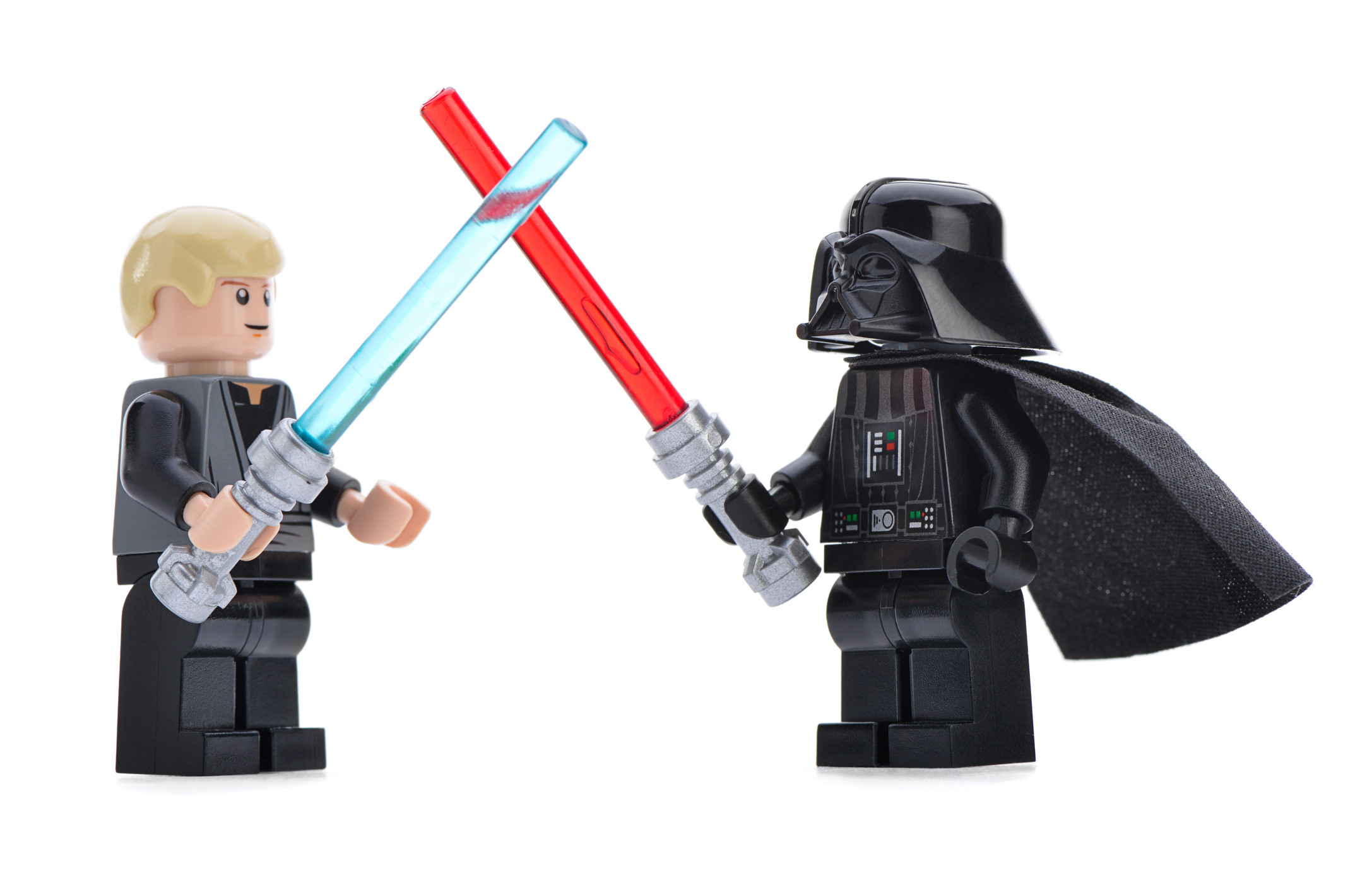 An iStock image of a lego Luke Skywalker and Darthvader fighting with lego lightsabers.