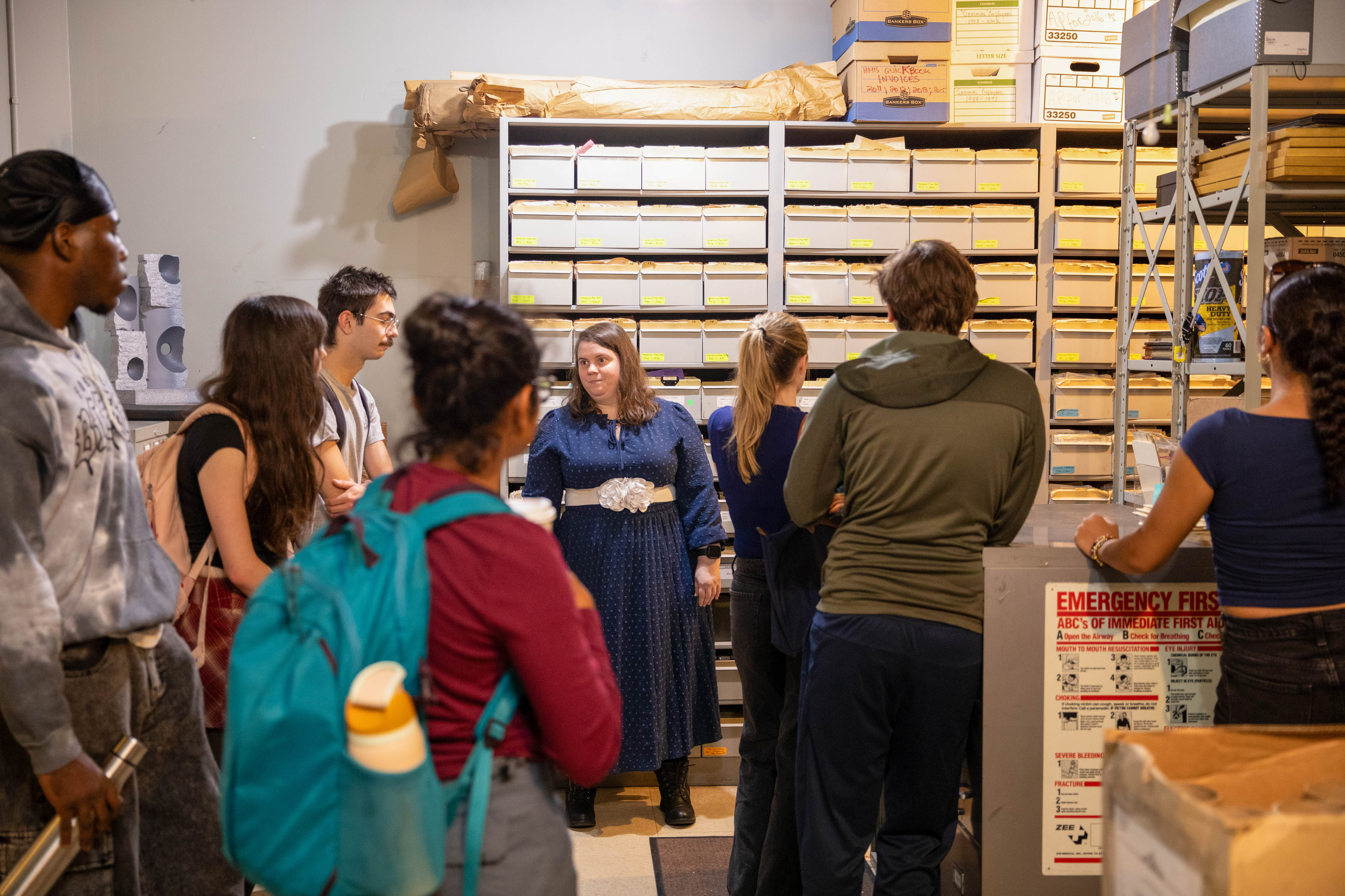 Jensen Allen, onsite director at Graceland, takes students through the cemetery's archives.
