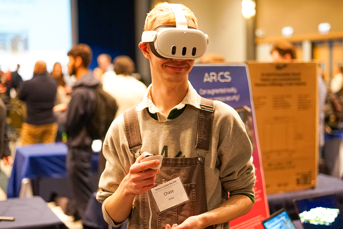 Student wearing a VR headset at Innovation Day 2024