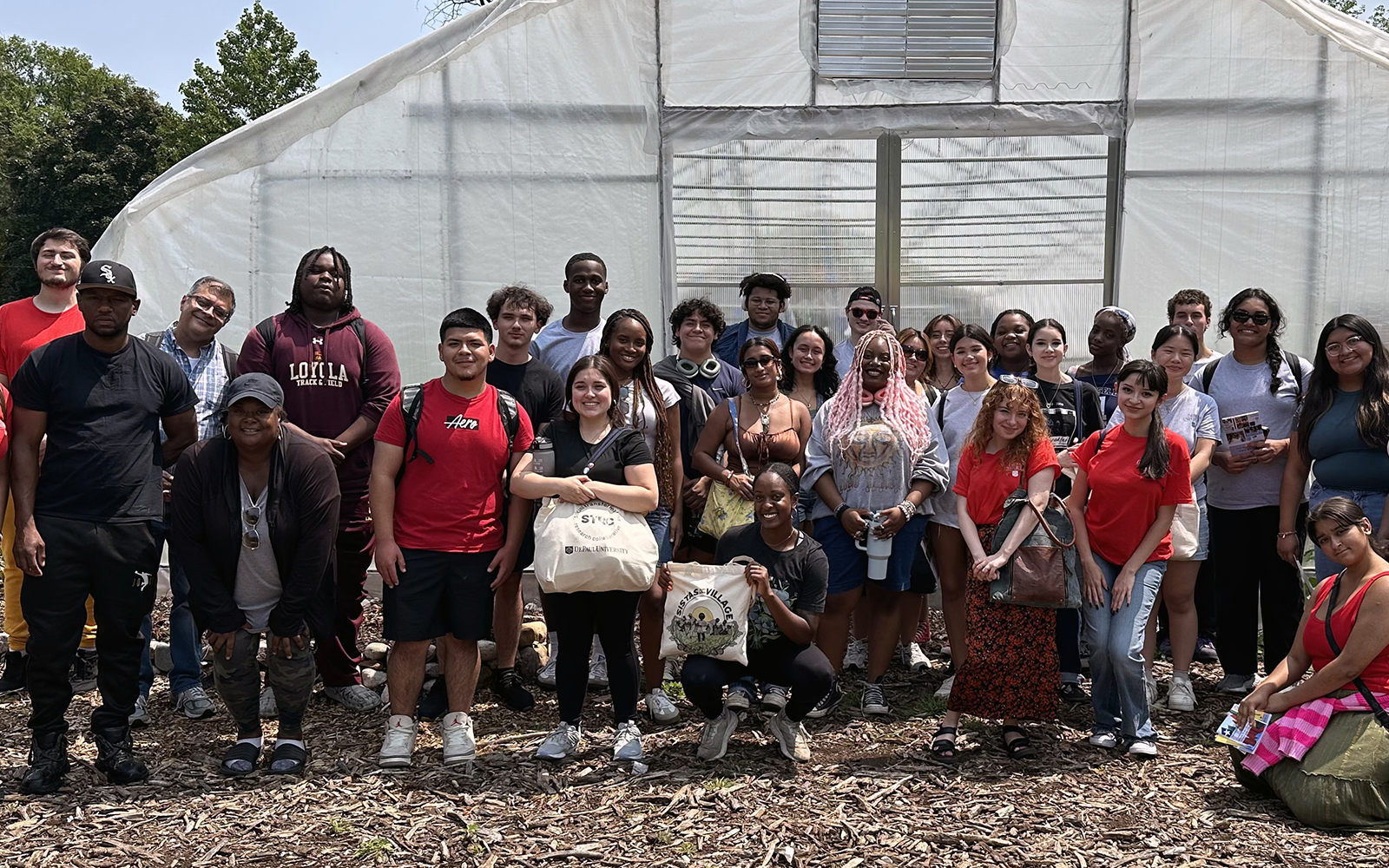 The Social Transformation Research Collaborative's Summer Institute visited Sistas in the Village, an urban farm in Chicago's Englewood neighborhood.