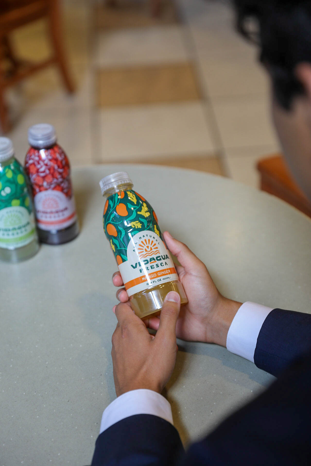 Student holding a drink Student holding a drink