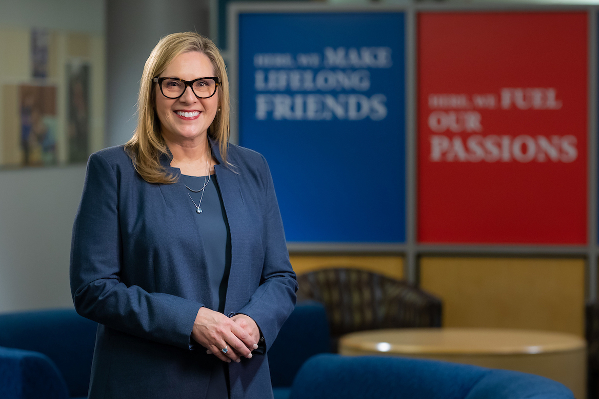 Kimberlie Goldsberry smiling with hands folded