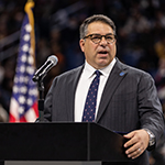 DePaul President joins Illinois governor in welcoming new citizens at Wintrust Arena 
