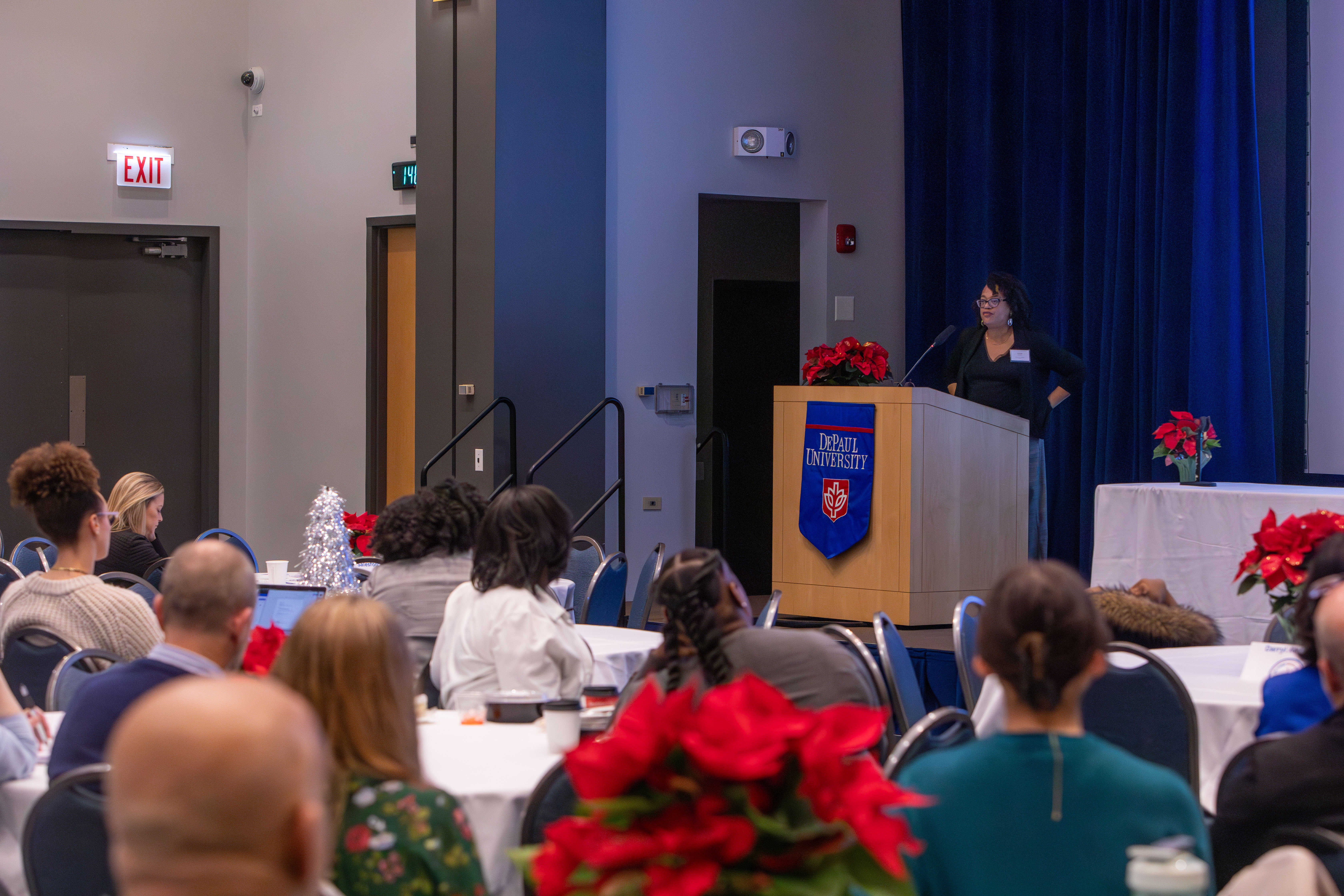 Brenda Williams informs DePaul faculty about continuing student success.