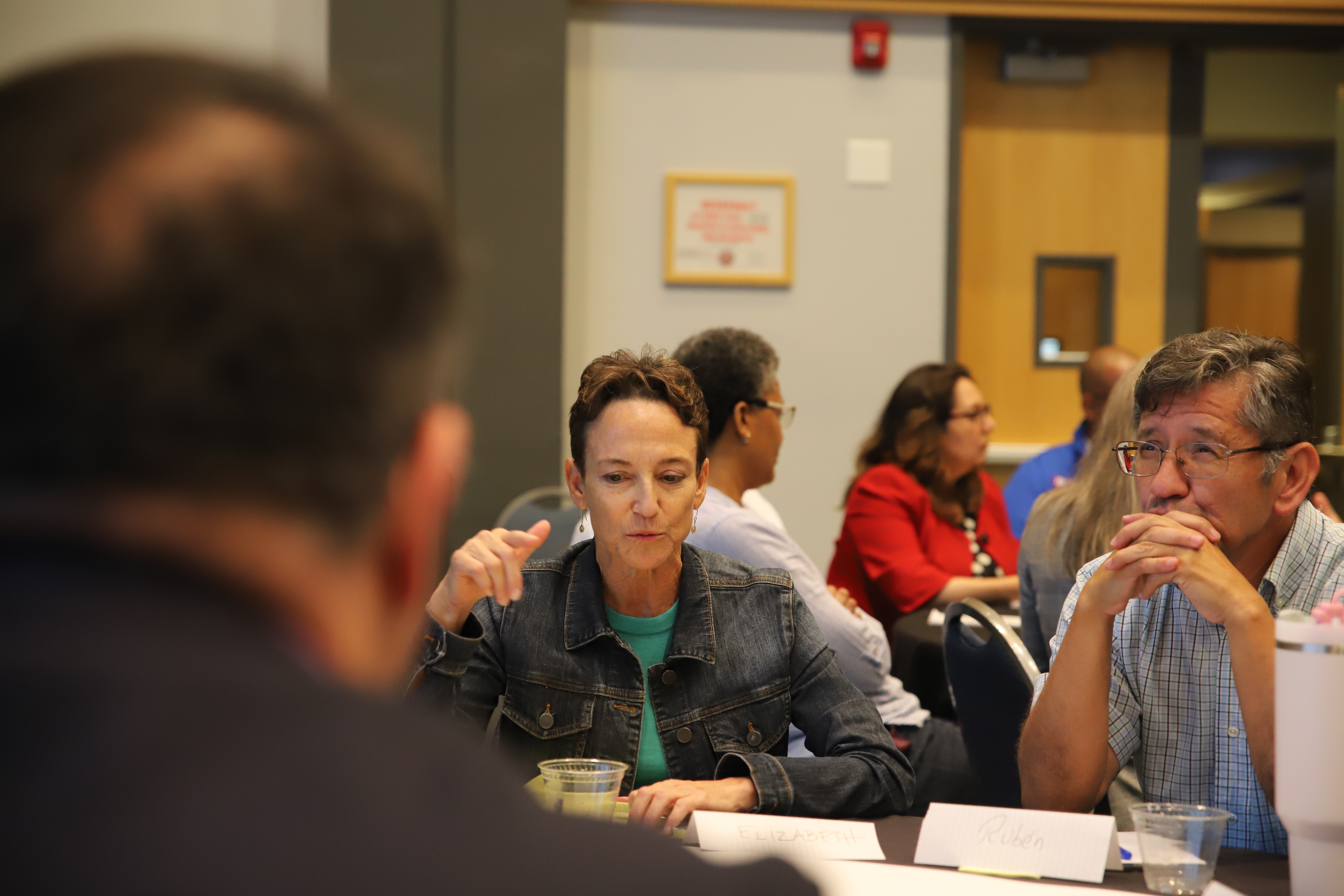 Participants engage in conversation.