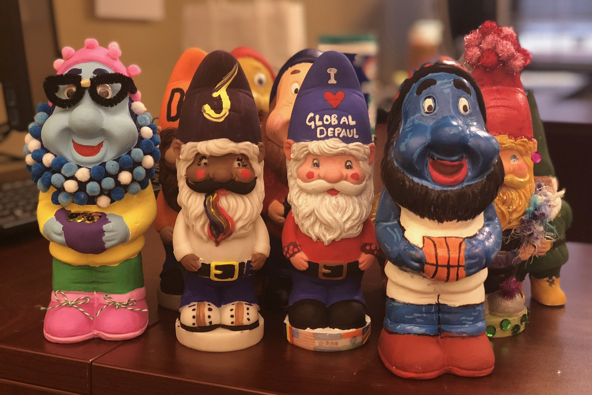 Painted ceramic gnomes on a table