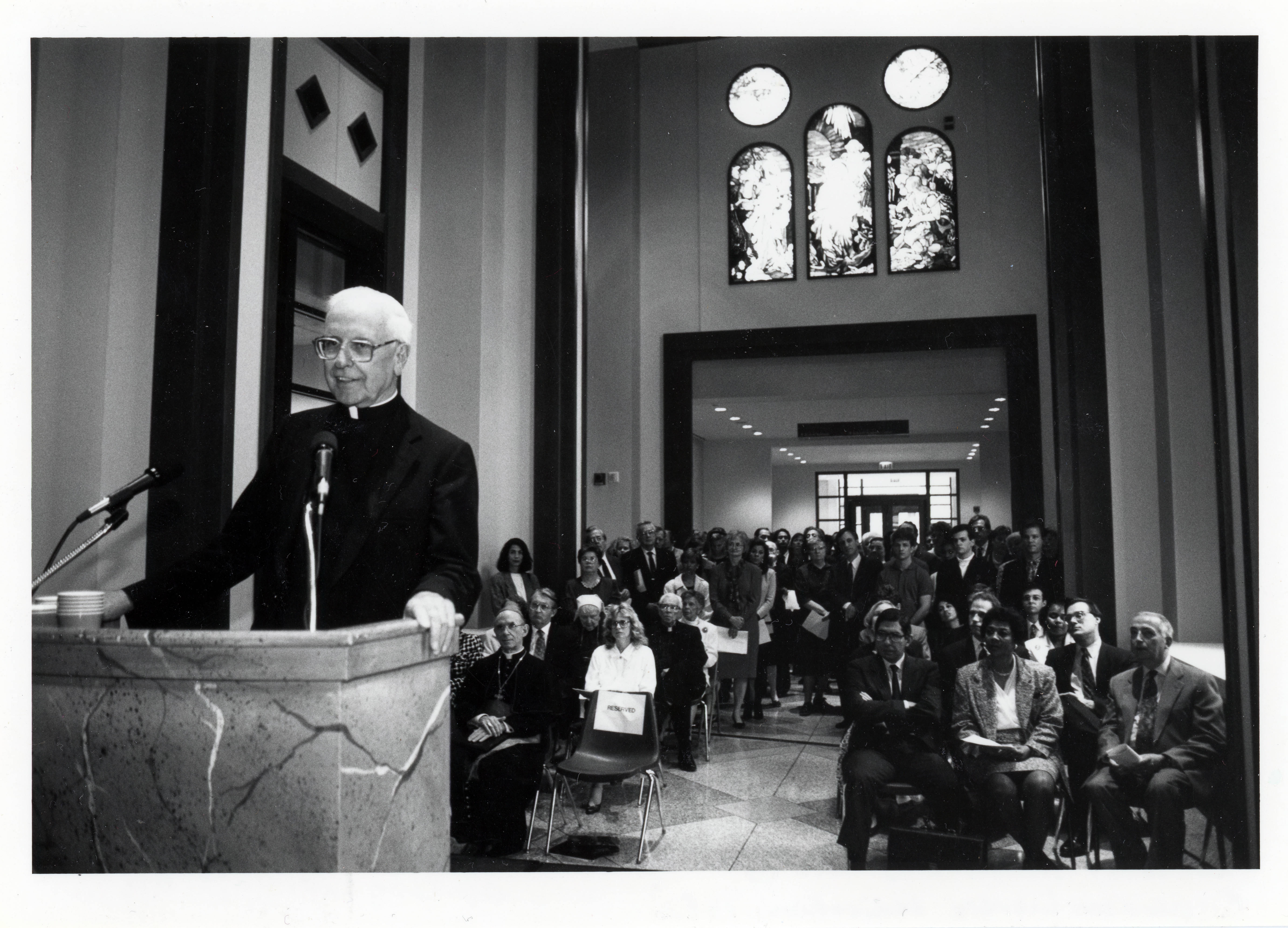 Fr. Richardson speaking at the Richardson Library dedication, 1992. 
