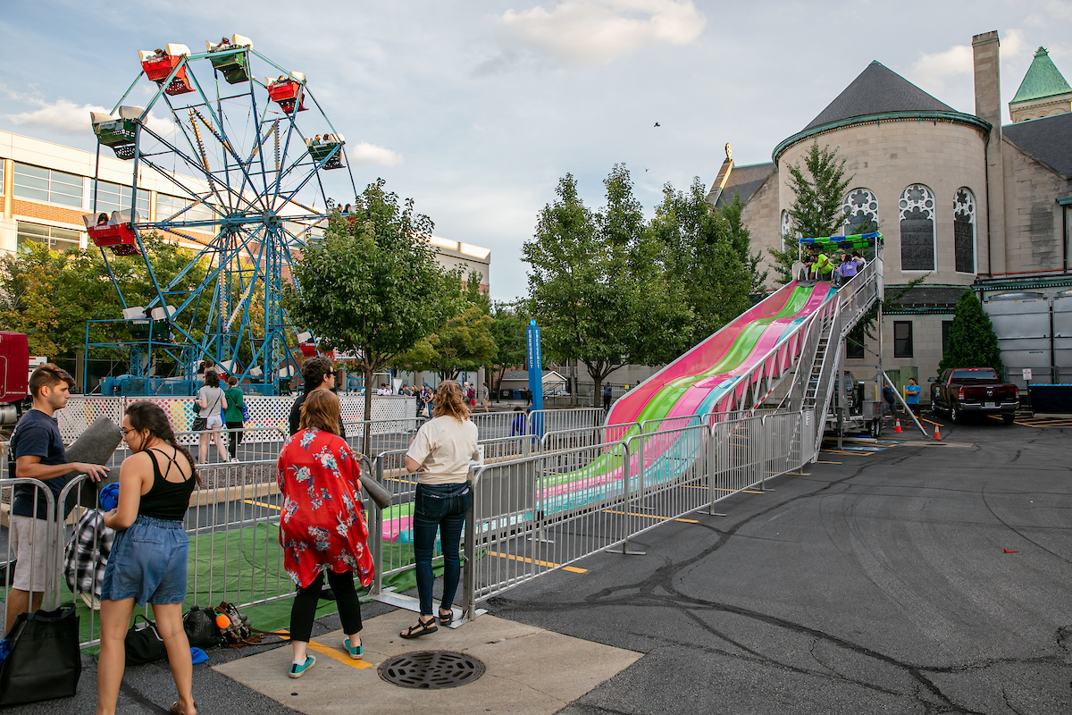 Students ended 2019 Welcome Week with a Ferris wheel, slides and other fun activities at First Friday Fun, and event organized by Courtney James and her team. (DePaul University/Randall Spriggs)