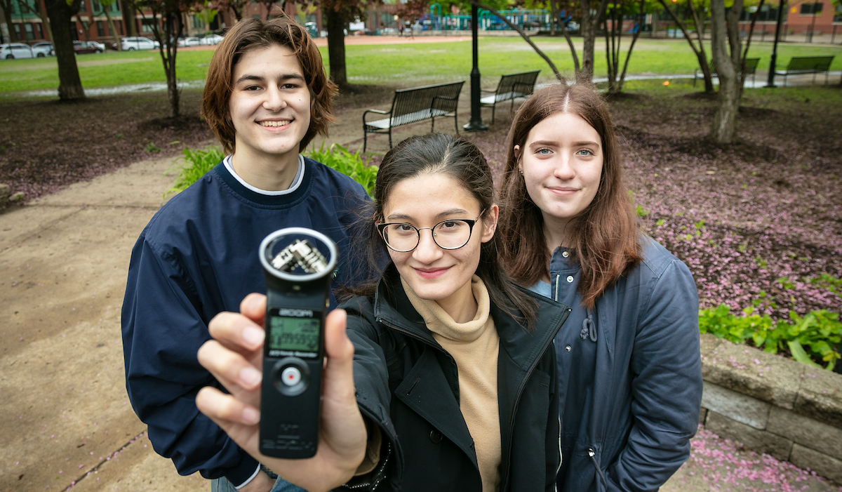 Left to right, Matthew Rosson, Ashlyn Royce and Bailey Didier, students in the College of Science and Health, are working with Liam Heneghan, professor of Environmental Science and Studies, on recording and studying soundscapes around the Chicago area. They are examining the implications of constant and busy sounds on health and well-being. (DePaul University/Jeff Carrion)