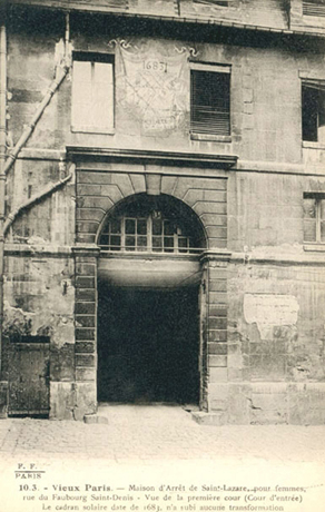 Exterior view, facing west, cour d’honneur, entrance way, sundial